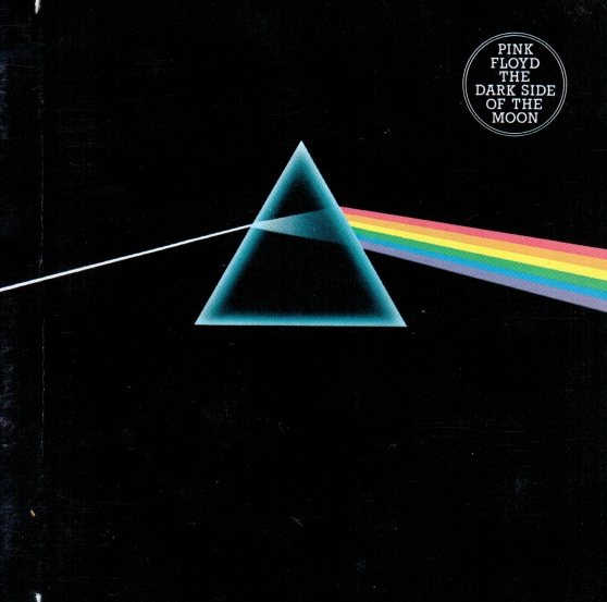 Iconic vinyl album cover of Pink Floyd's "The Dark Side of the Moon" with a prism refracting light